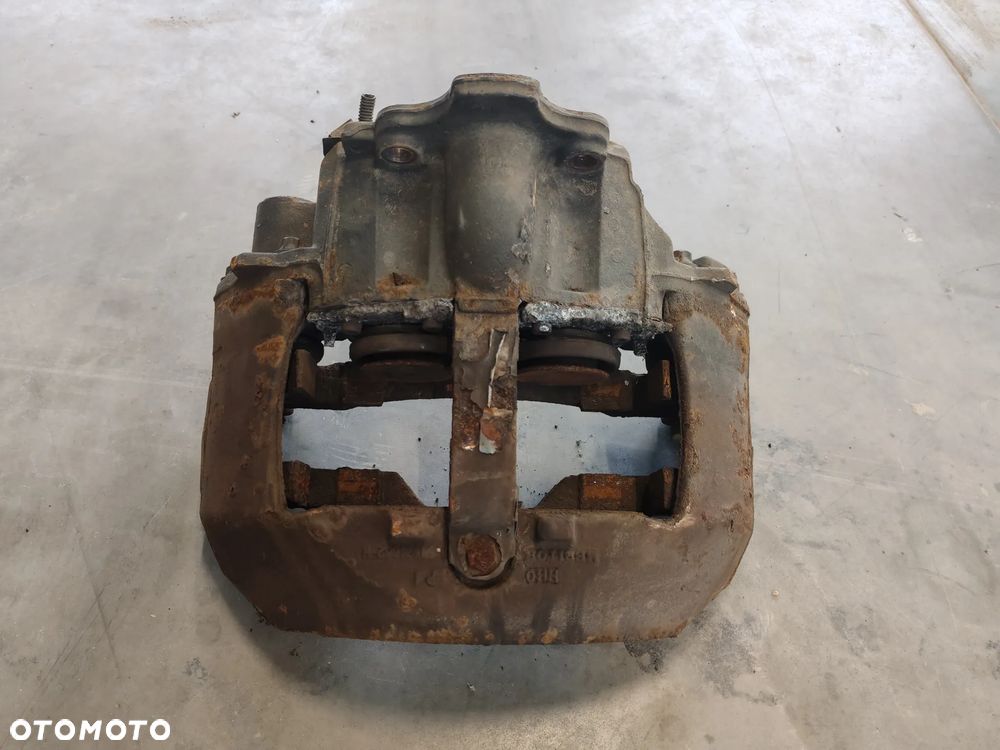 ZACISK HAMULCOWY TYŁ TYLNY PRAWY RENAULT PREMIUM MAGNUM DXI RENAULT RANGE T C K - 1