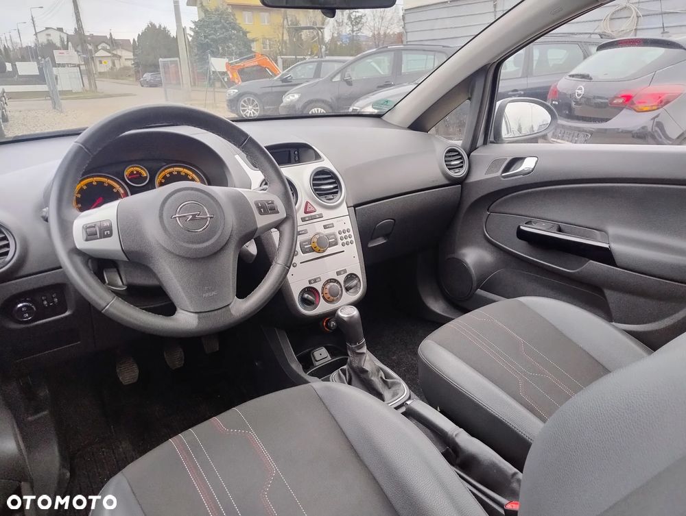 Opel Corsa 1.2 16V Enjoy - 11