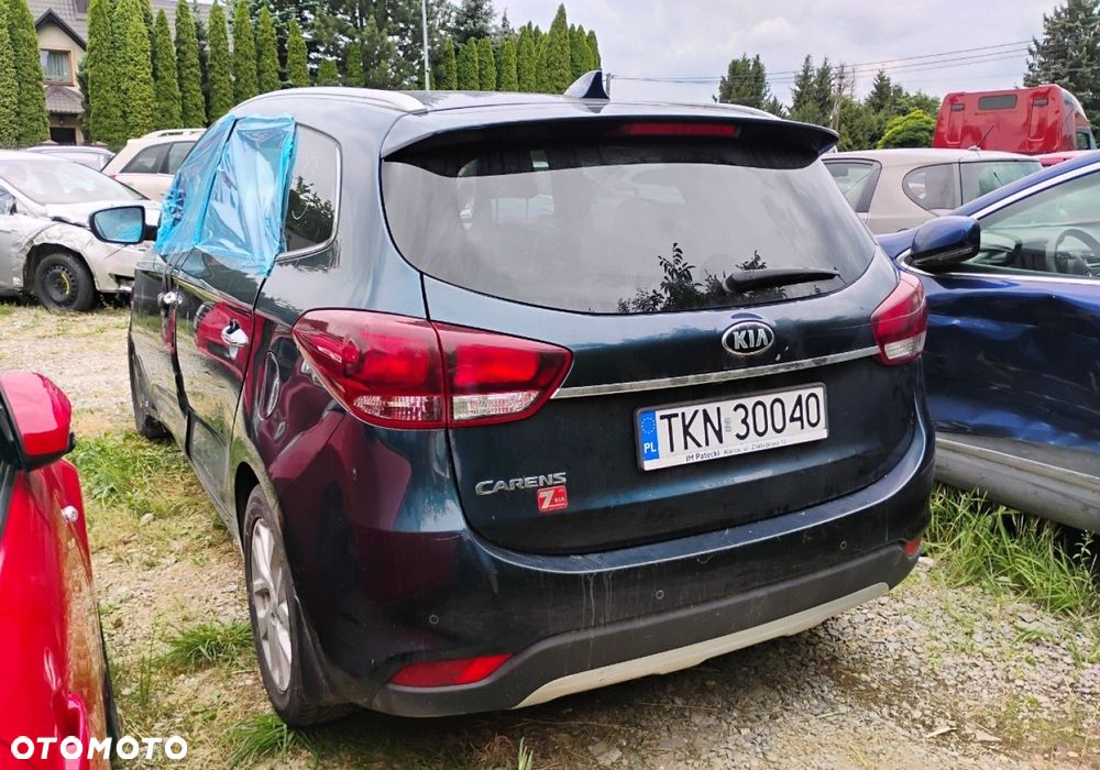 Kia Carens - 4