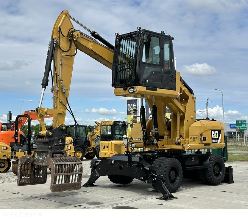 Caterpillar M313D * Podnoszona Kabina * A2-BUD *