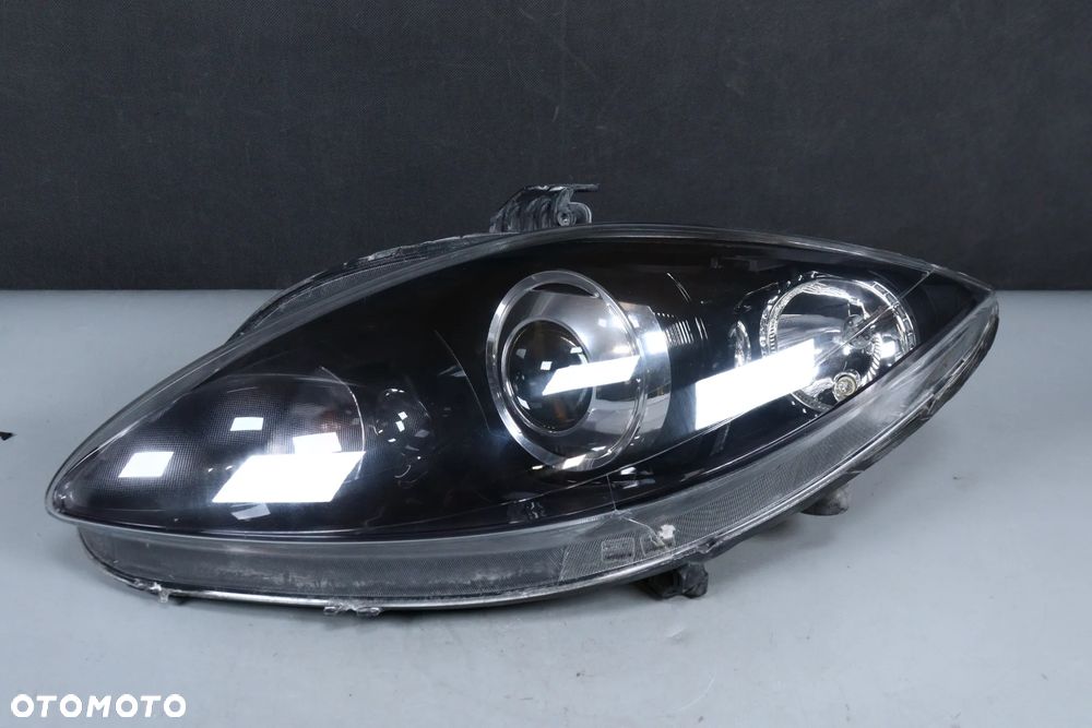 Lampa lewy przód Bi-Xenon Skrętny Seat Leon II Altea (04-09) Przedlift EU - 2