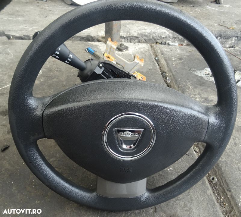 Plansa de bord Dacia Logan din 2013 cu airbag volan si pasager volan pe stanga - 2