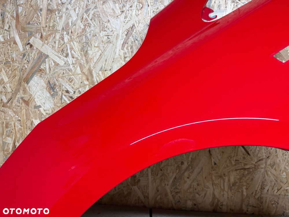 BŁOTNIK LEWY PRZÓD LEWY PRZEDNI OPEL CORSA E CZERWONY 50B - 19