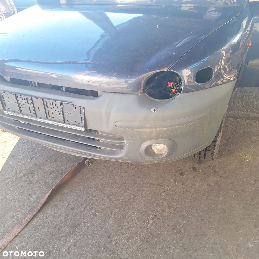 MASKA ZDERZAK DRZWI BLOTNIK LAMPY SZYBA CZESCI MULTIPLA 339/7 - 9