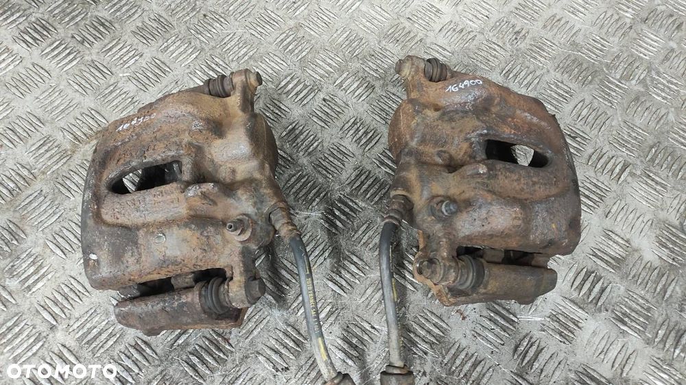 ZACISK HAMULCOWY PRAWY PRZÓD + LEWY PRZÓD  RENAULT TRAFIC II - 1