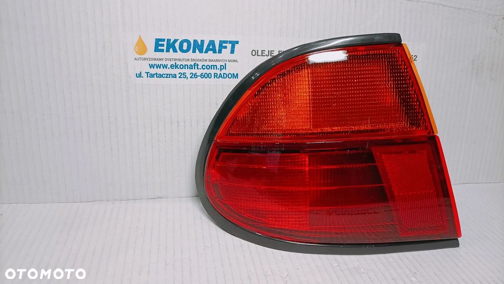 Lampa tylna lewa Nissan Almera  N15 sedan 4D