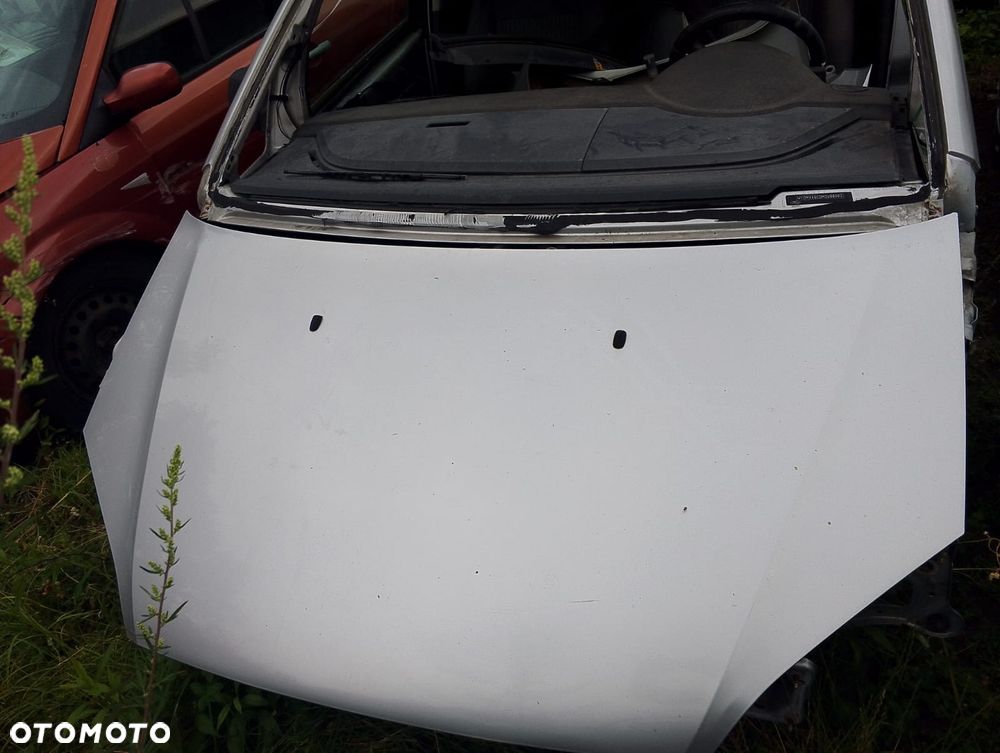 Ford Focus C-Max (03-06r.) 1.6D 119KM. Silnik DV6 Skrzynia MTX75 lakier O3 - Moondust Silver (Metallic). Cały na części GWARANCJA !!!!  Przód Tył Zestaw Komplet Drzwi Klapa Zderzak Błotnik Maska Grill Atrapa Szyba Pas Lampa Lusterko Boczki Fotel Kanapa Kokpit Deska Rozdzielcza Przełącznik Włącznik Sterownik Przewody Wiązka Instalacja Moduł Komputer Czujnik Listwa Pompa Alternator Wtryski Głowica Rozrusznik Kompresor Sprzęgło Dwumas Silnik Skrzynia ABS Klimatyzacji Paliwa Wspomagania Kolektor Turbina Przepustnica Zawór Chłodnica Koło Hak Belka Sanki Zawieszenie Mcpherson Półoś Amortyzator Wydech Tłumik Zacisk Most - 2