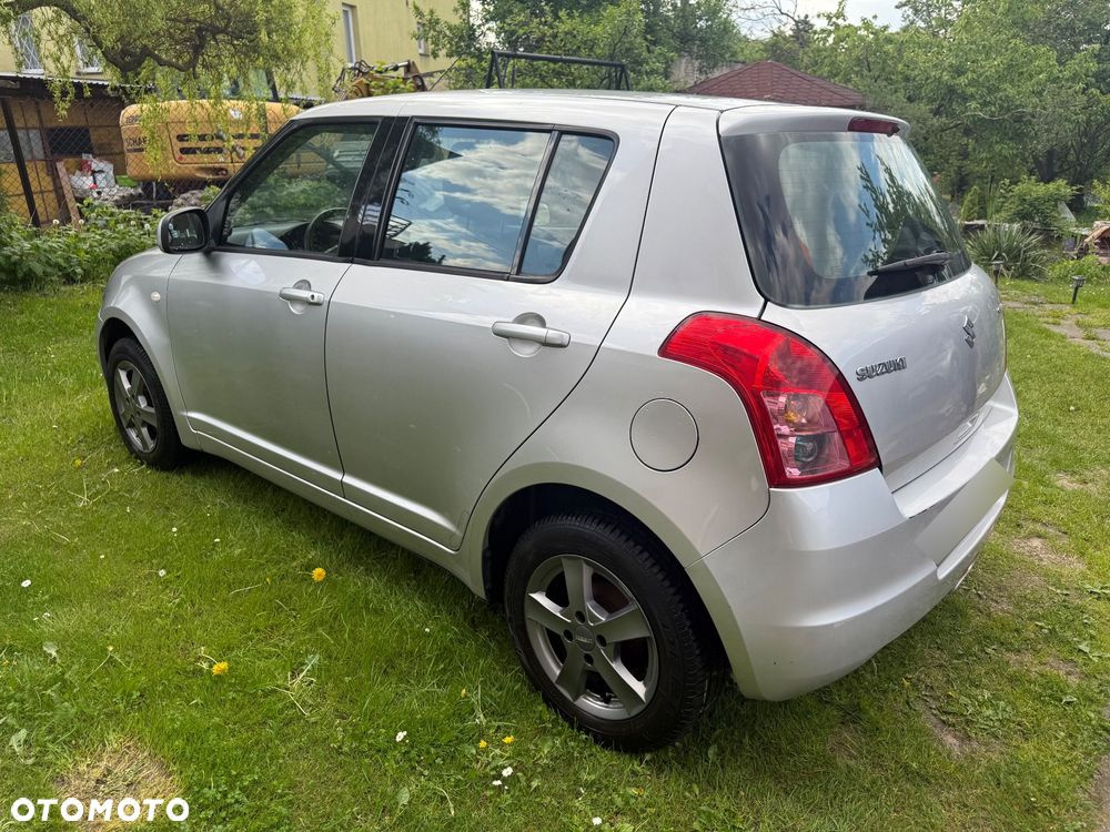 Suzuki Swift 1.3 Club - 7