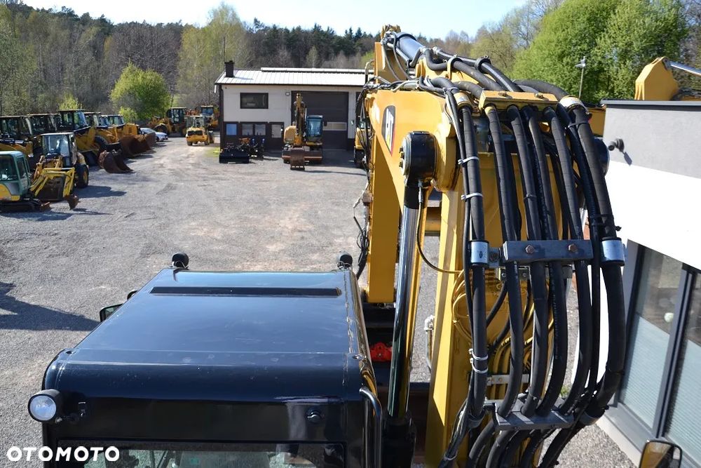 Caterpillar M 313 D, ROTOTILT - 17