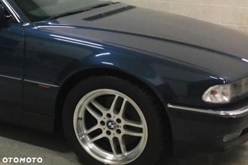 Blotnik prawy lewy e38 sorrentblau przedlift Ładny - 3