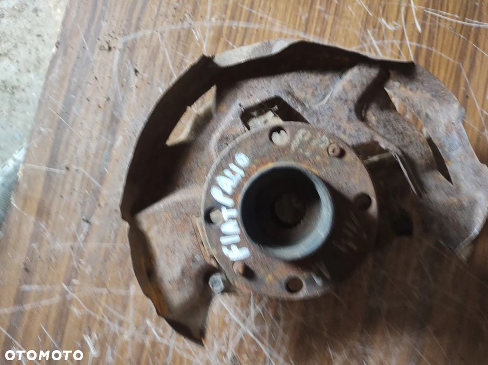 FIAT SIENA PALIO zacisk jarzmo przód lewy piasta - 1