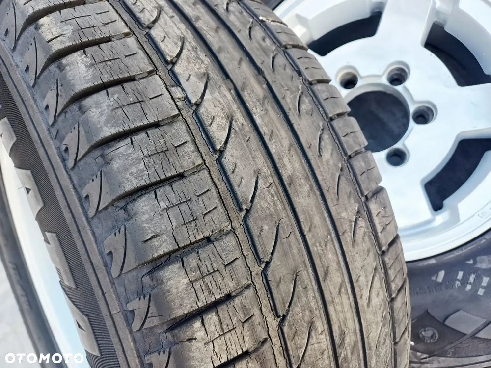 FELGI Z OPONAMI KOŁA ALUMINIOWE ISUZU TROOPER R15 6X139.7 ET -15 110 mm OPONY R15 265/70 NR20 - 15