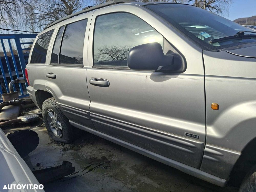 Usa dezechipata stanga/dreapta, fata/spate Jeep Grand Cherokee 2004 - 1