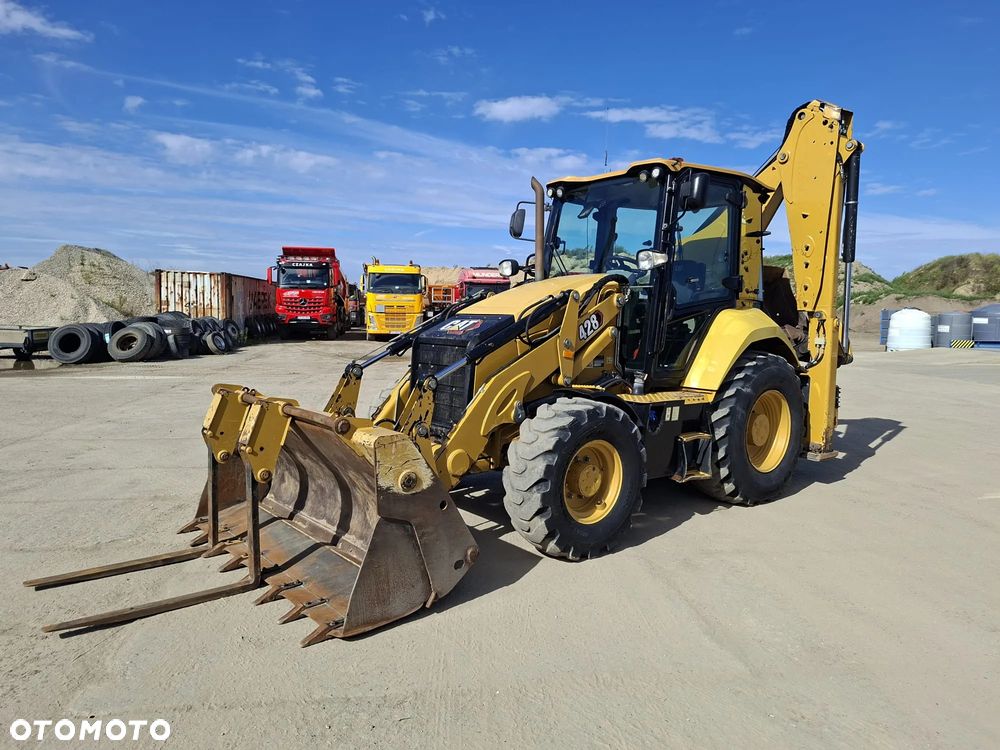 Caterpillar 428 - 16