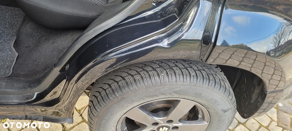 Suzuki Grand Vitara 1.9 DDiS - 9