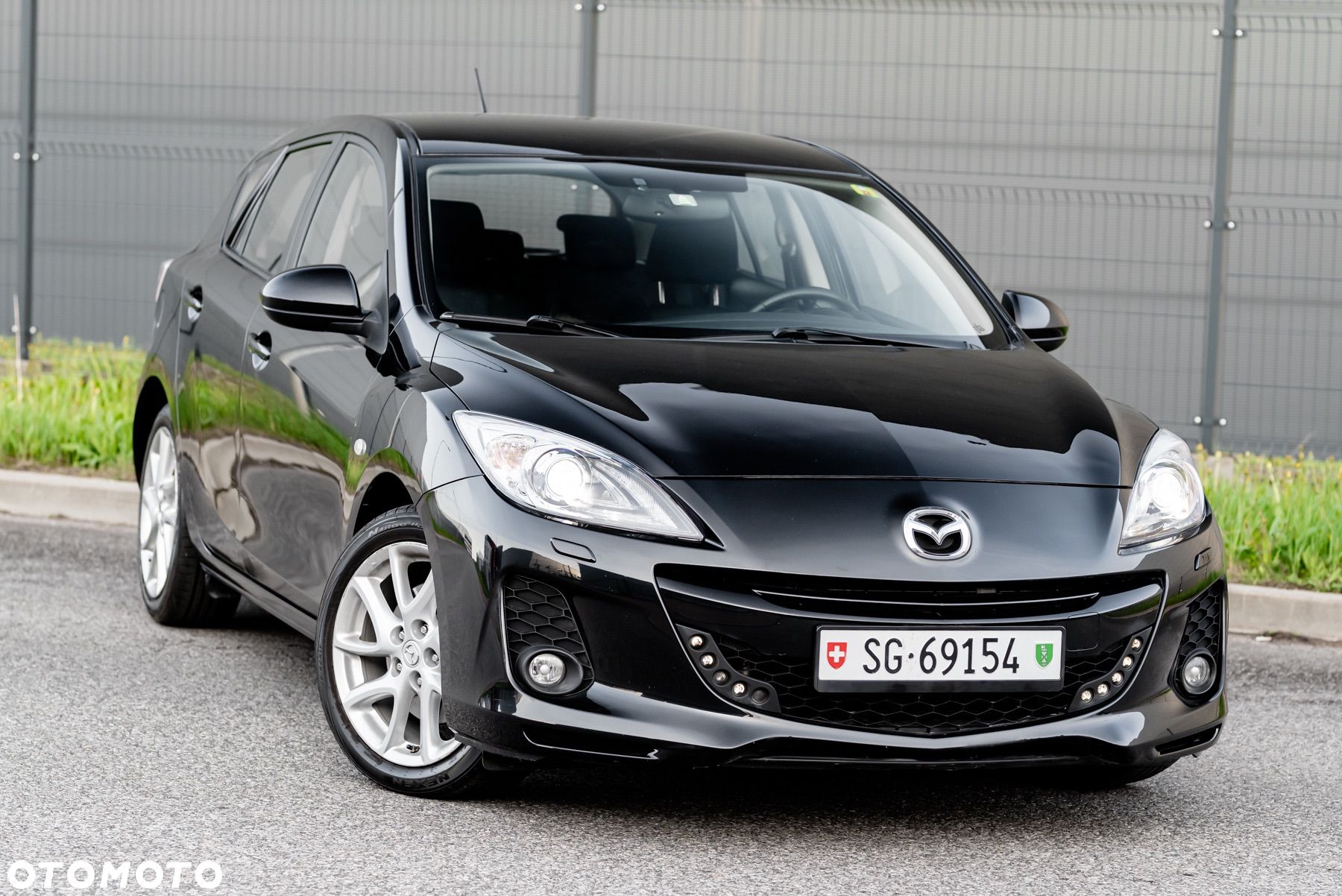 Mazda 3 2.0 MZR DISI Sports-Line - 1