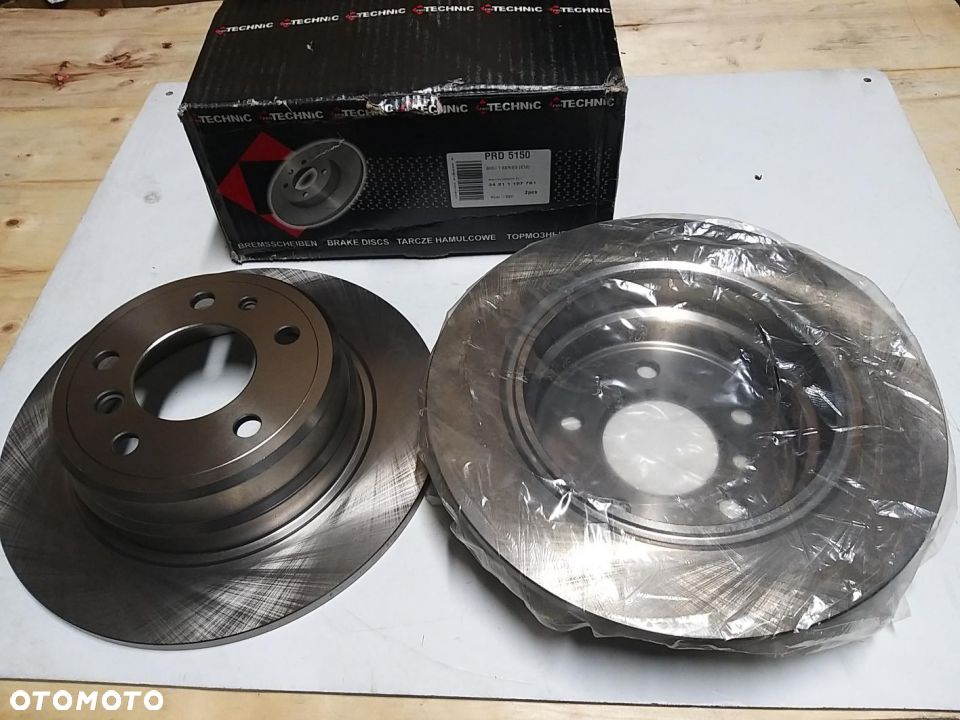 TARCZA HAM 300X10 P 5-OTW ,4 BMW 7  E32 87-94 ROK TYŁ PRD5150 34211157781 34211165258