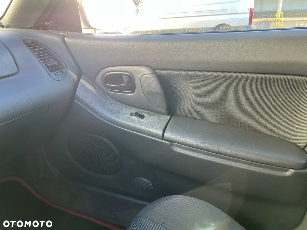 Mazda 323F 1.5 - 14
