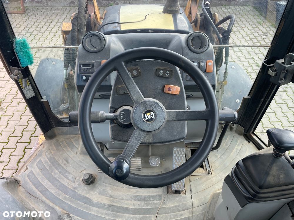 Caterpillar 428E - 12