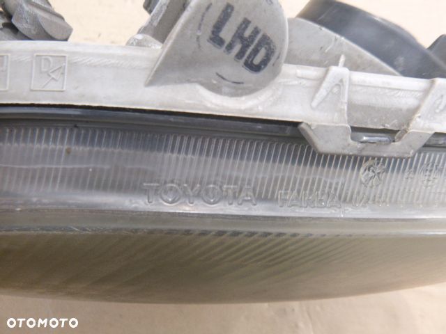 LAMPA LEWY PRZÓD LEWA PRZEDNIA TOYOTA COROLLA E12 01- - 14