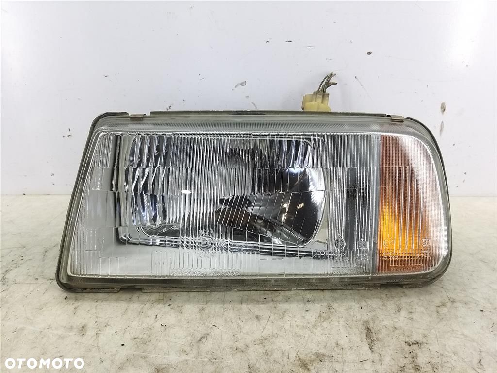 Reflektor lampa przód lewa SUZUKI VITARA I 1988–1997 100-32224 L - 1