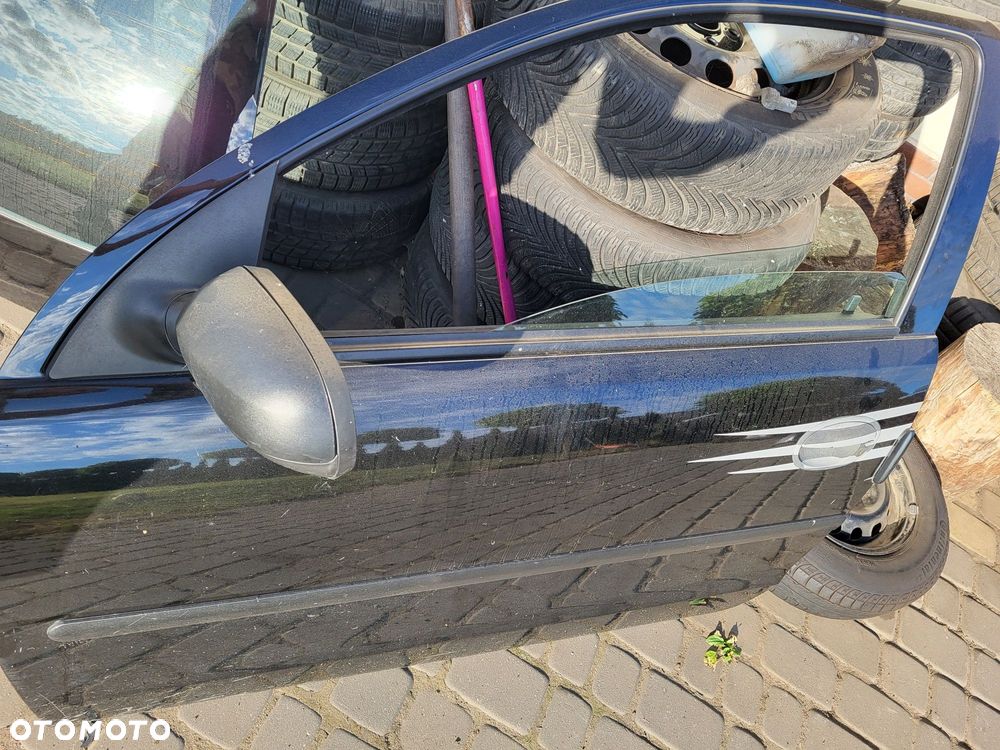 Drzwi przednie lewe opel corsa c 3d lakier z20c kompletne bez korozji