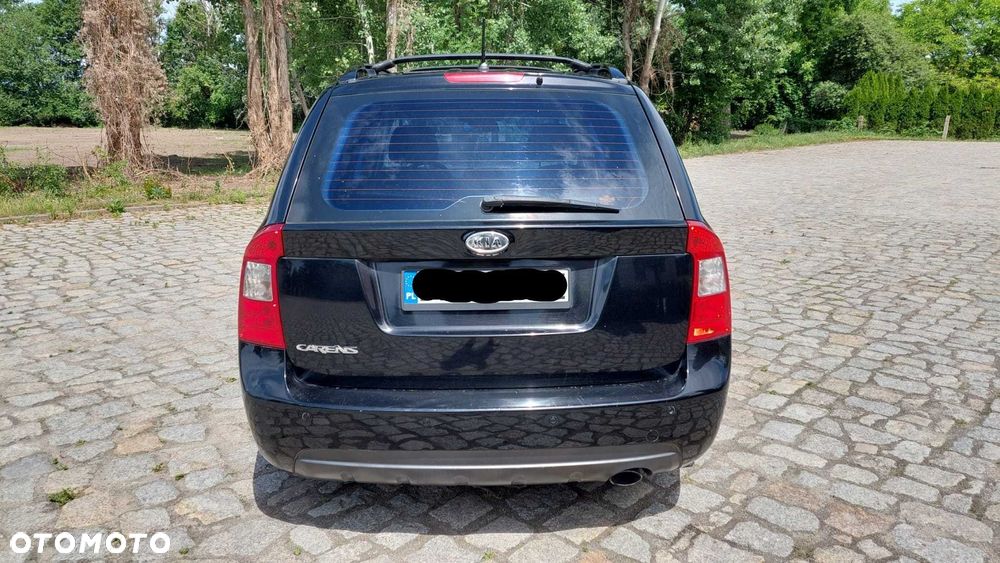Kia Carens - 4