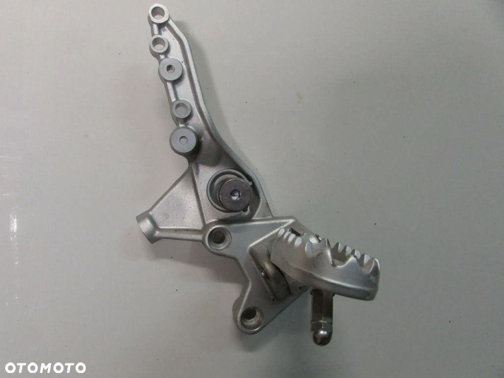 Triumph Tiger 900 20+ podnóżek set prawy przód uszkodzony - 1