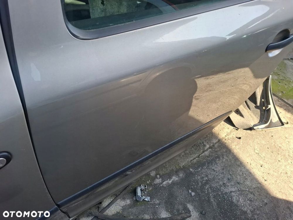 DRZWI LEWE TYŁ TYLNIE SKODA OCTAVIA II 9202 - 2