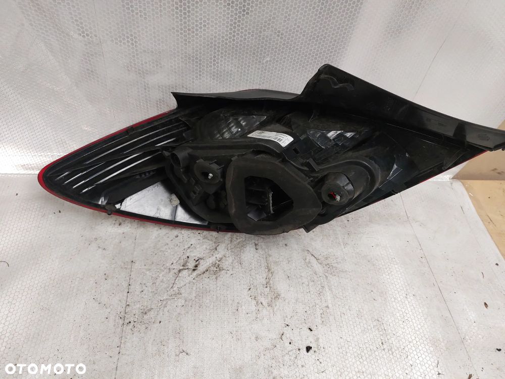 .  LAMPA TYL TYLNA PRAWA OPEL CORSA D !5D ! - 3