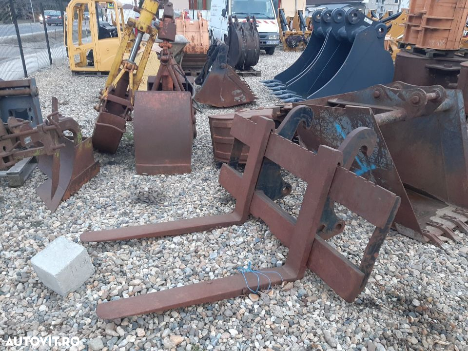 Furci incarcator frontal Noi si Sh - 9