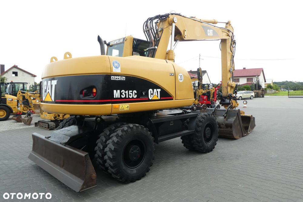 Caterpillar M315C Z NIEMIEC TRZY ŁYZKI - 5