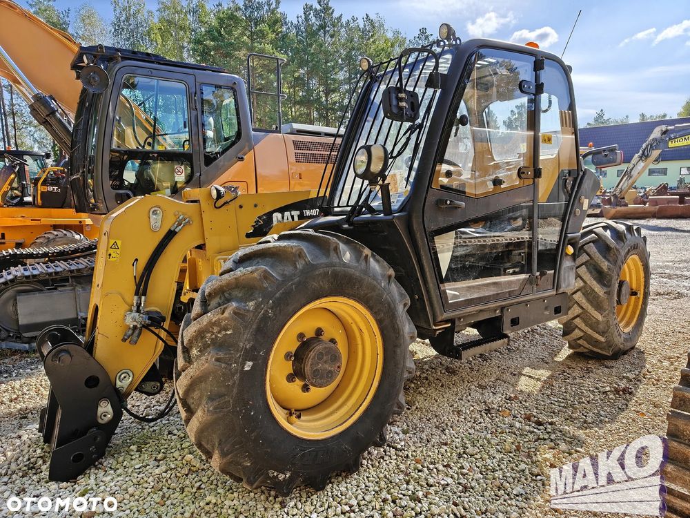 Caterpillar TH407 - 1