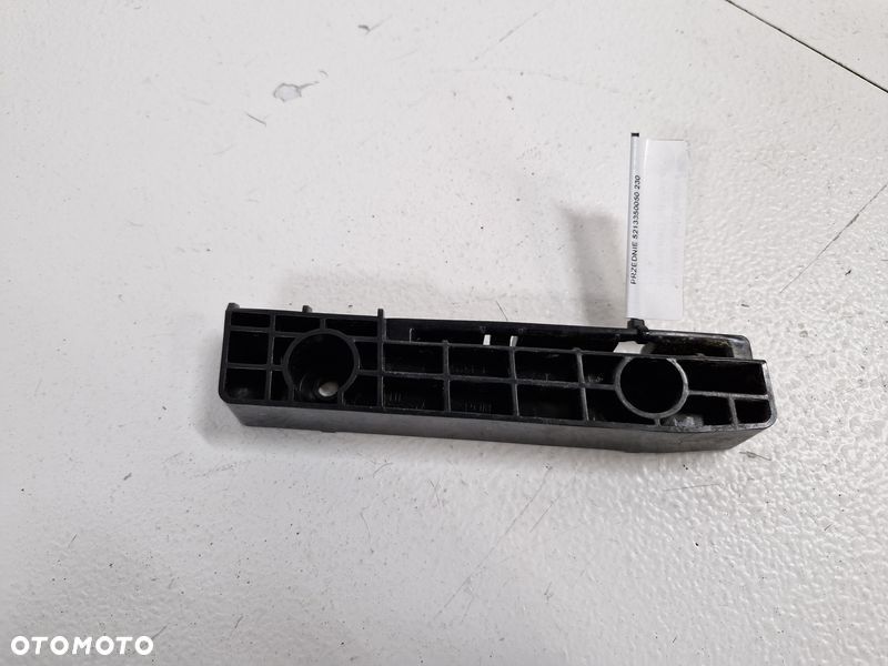 LEXUS LS460 LS600 IV 4 ŚLIZG UCHWYT ZDERZAKA PRAWY PRZÓD MOCOWANIE PRAWE PRZEDNIE 5213350050 - 5