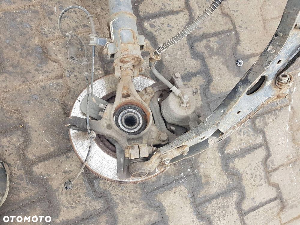 KIA CARENS IV 13-19r 1.7 CRDI WAHACZ AMORTYZATOR ZWROTNICA LEWA PRZÓD - 4