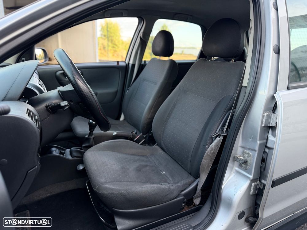 Opel Corsa 1.2 16V Enjoy - 9