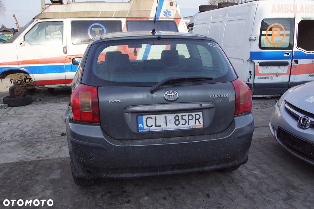 Auto na części - Toyota Corolla E12 1.4 VVT-i 97 KM 4ZZ-FE MTM 1C3 2002R Silnik Skrzynia Drzwi Maska Klapa Zderzak Błotnik Szyba Klamka Lampa Lusterko Deska Kokpit Sterownik Moduł Czujnik Licznik Panel Kierownica - 4