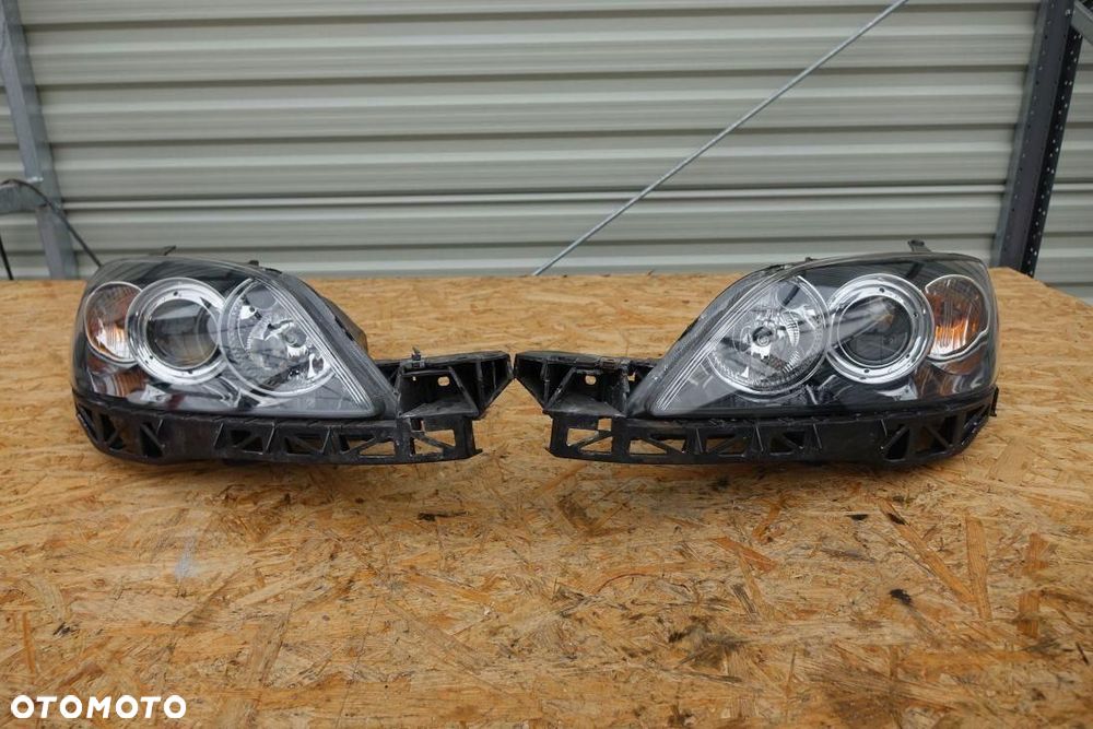 REFLEKTOR 2 LAMPY PRZÓD KPL EUROPA MAZDA 3 03-06 5343534 - 2