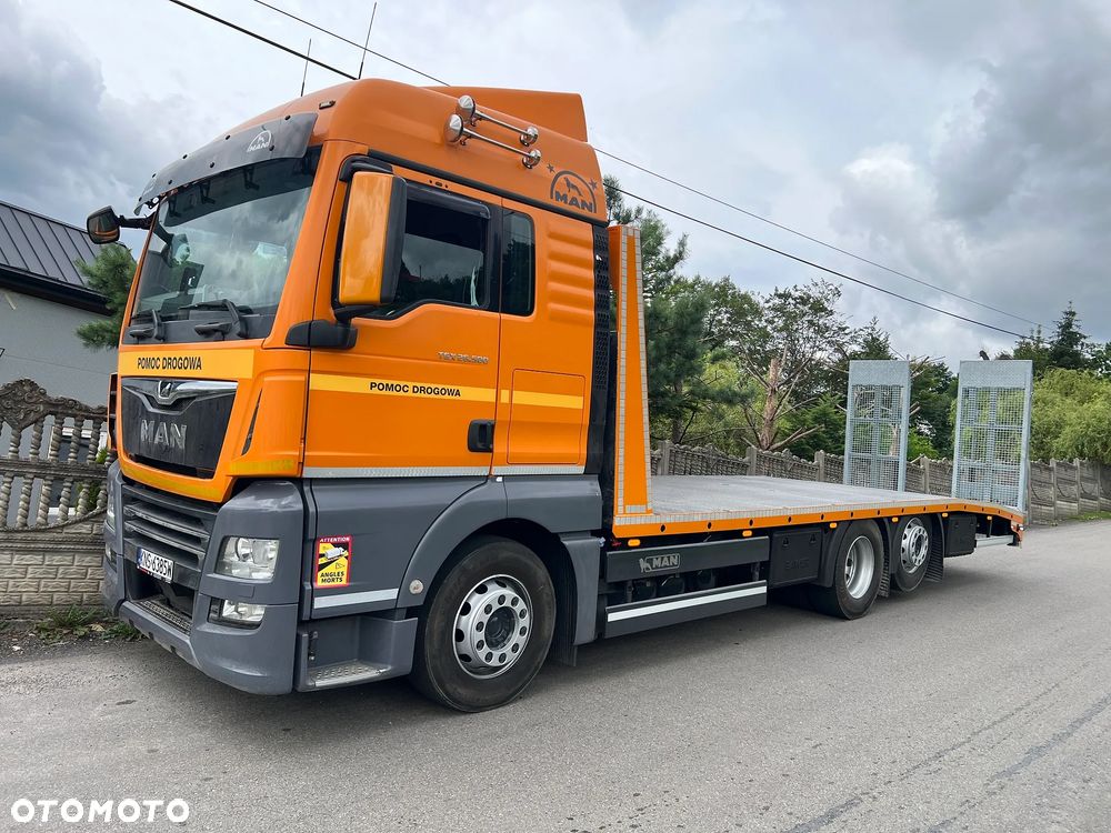 MAN TGX 26.500 | XLX | Euro 6 | 6x2 | INDIVIDUAL | Skrętna Oś | Nowa Zabudowa | Rampy Hydrauliczne | Autolaweta 8,20m | Pomoc Drogowa | Najazd | z Niemiec | STAN PERFEKCYJNY | Tylko 587 tys km | - 3