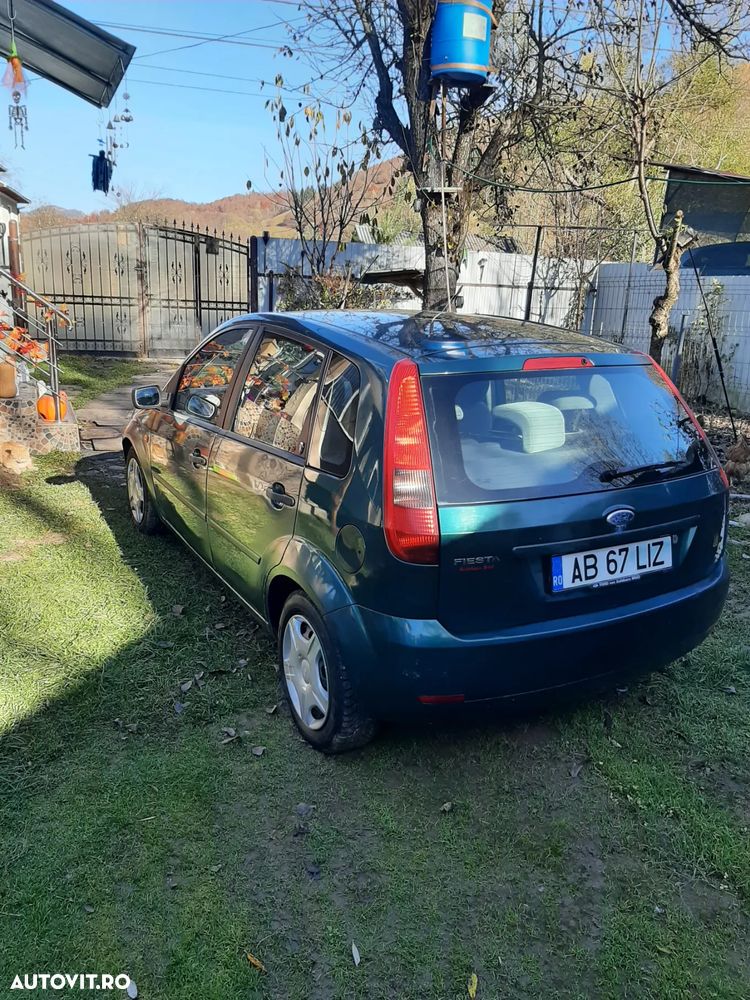 Ford Fiesta 1.4i Ghia - 5