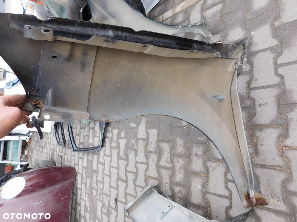 błotnik lewy prawy przód FIAT CROMA II brąz - 11