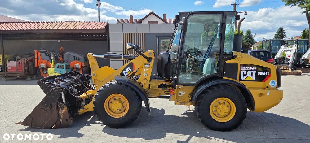 Caterpillar <<Ładowarka CAT 906H2, tylko 2900Mtg pełny serwis CAT,szczęka+widły,z Niemiec>>>> - 1