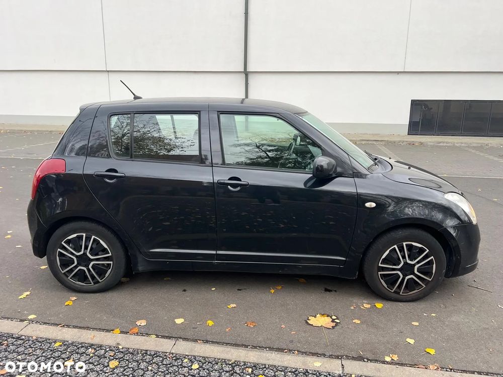 Suzuki Swift 1.3 Club - 7