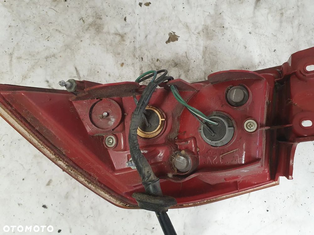 * LAMPA TYLNA LEWA TYŁ LEWO MITSUBISHI LANCER 8 - 7