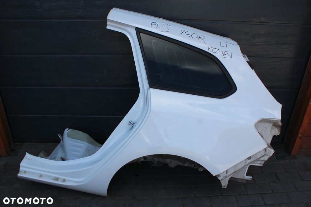 BŁOTNIK ĆWIARTKA LEWY TYŁ OPEL ASTRA J KOMBI Y40R