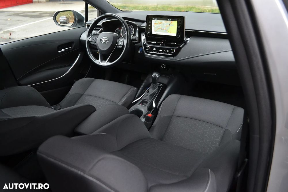Toyota Corolla 2.0 HSD Exclusive - 6