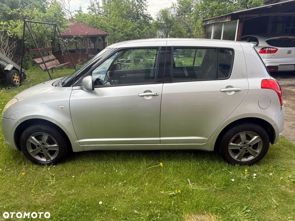 Suzuki Swift 1.3 Club - 3