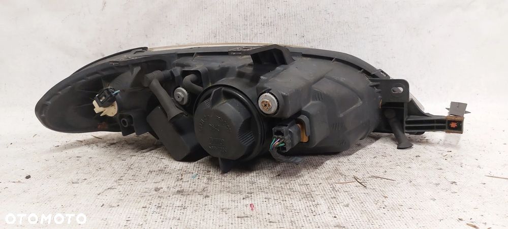 .  PRZOD PRZEDNIA LAMPA LEWA CHEVROLET LACETTI - 4