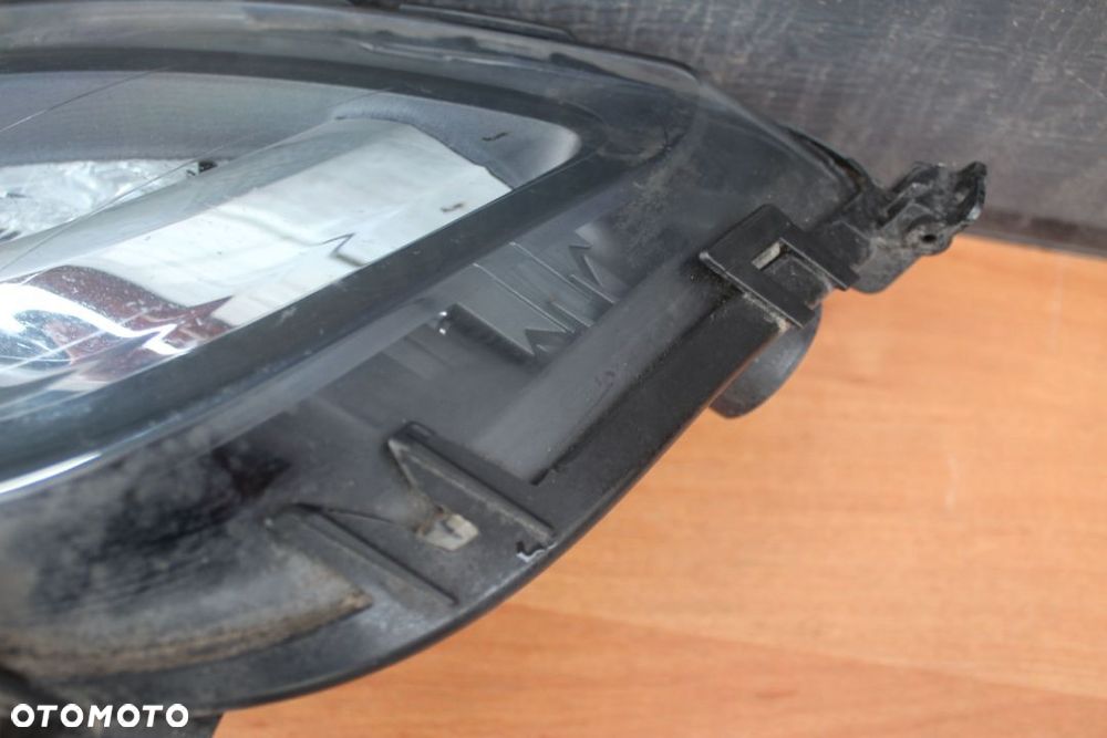 KIERUNKOWSKAZ LEWY ZDERZAKA OPEL ASTRA J - 4