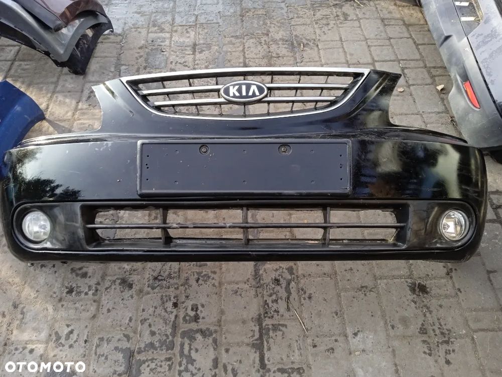 ZDERZAK PRZEDNI KIA CARENS 02-06